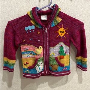 Filo Arts Knit Sweater with Playful Design